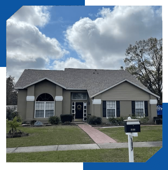 Single-story home with a new gray architectural shingle roof, viewed from the front lawn