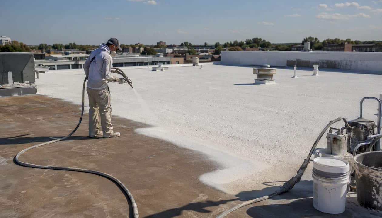Spray foam roofing application on commercial roof